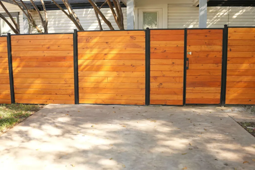 Custom wood and metal fence